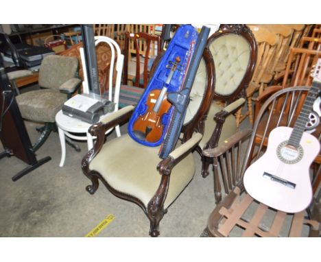 A pair of Victorian styled button backed upholstered armchairs