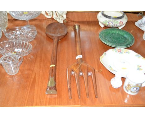 A large wooden spoon and fork