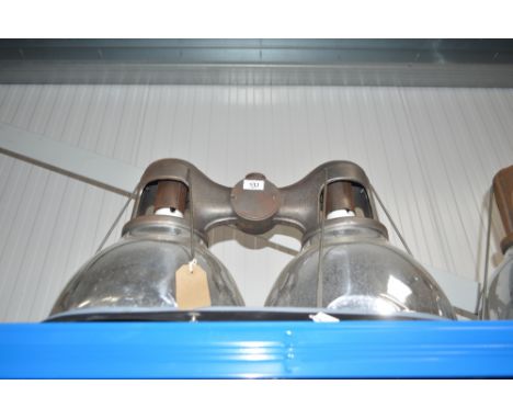 An industrial style double ceiling light with cast iron frame
