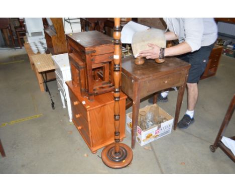 A mahogany turned standard lamp