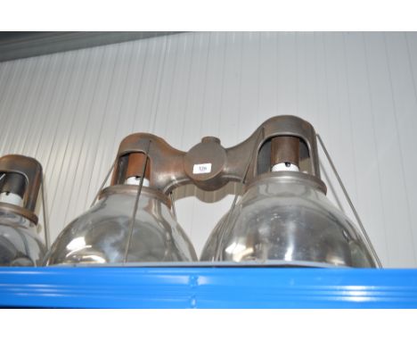 An industrial style double ceiling light with cast iron frame
