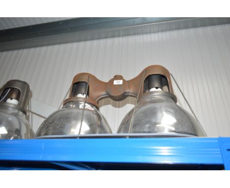 An industrial style double ceiling light with cast iron frame