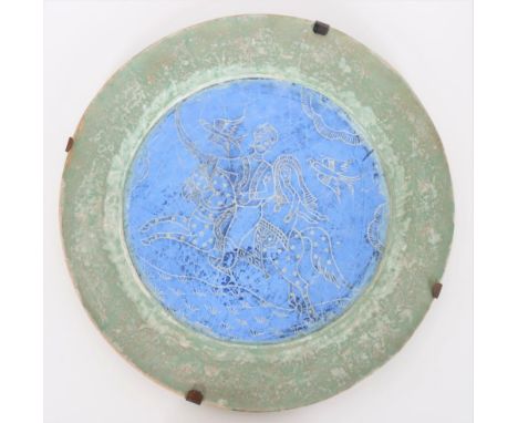 Decorated ceramic charger, signed on the back. Size: 16 1/2 in. diameter