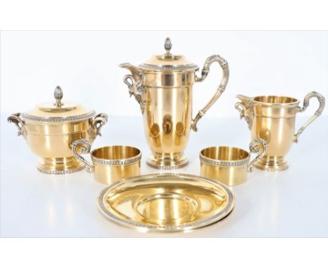 French Vermiel, gold wash over silver, sterling tea service. Weight: approx 50 OZT. Tallest size: 6 x 3 1/2 x 6 in.