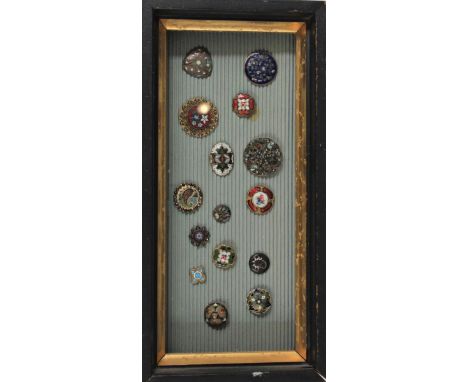 Vintage buttons in shadow box frame, enamel and metal. Size: 12 x 5 3/4 in.