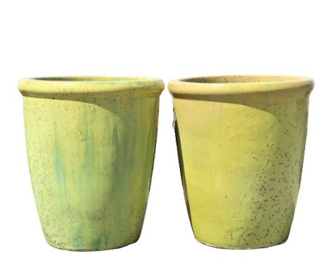 Yellow-green glazed color, ceramic planters with drain holes. Size: 15 1/2 x 17 in.