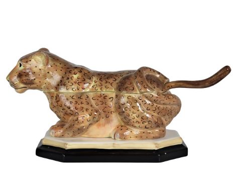 This is a lovely porcelain cheetah punch bowl with the tail acting as the ladle. Piece is marked underneath. Size: 21 x 9 x 1