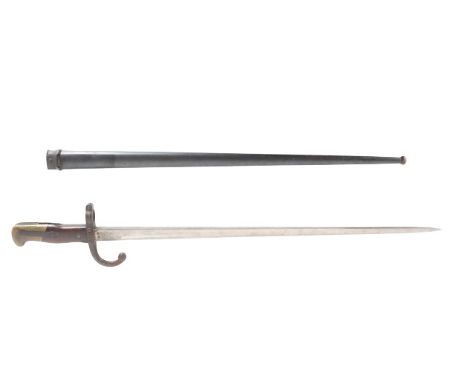 Beautiful French bayonet and scabbard with inscription on the spine of the blade which reads “Mre d’Armes de St. Etienne Janv