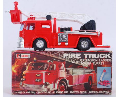 CLIFFORD TOYS: A vintage Clifford Toys Fire Truck battery operated plastic toy. Within the original box ' Mystery Action, Lig