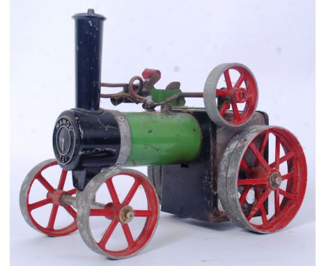 MAMOD: An original vintage Mamod Live Steam traction engine TE1. With green boiler, notation to front.


WORLDWIDE POSTAGE AV