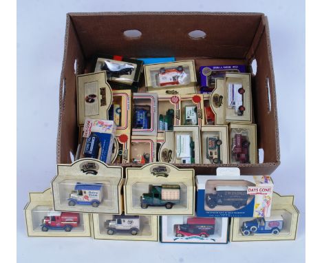 LLEDO: A collection of approx 25x Lledo diecast model ' Days Gone ' cars. Each within the original boxes.

WORLDWIDE POSTAGE 