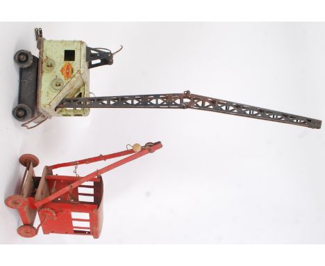 CRANES: Two vintage post war tinplate toy cranes. The first being a Marx Toys ' Lumar Contractors ' crane, the second likely 