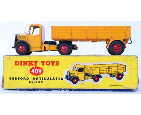 DINKY: An original vintage Dinky Toys boxed diecast model 409 Bedford Articulated Lorry, in yellow. Within the original box. 