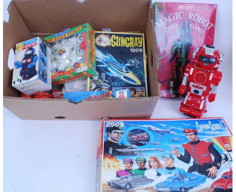 TOYS & GAMES: A box of assorted vintage toys and games to include jigsaws ( Captain Scarlet, Superman and Stingray etc) along