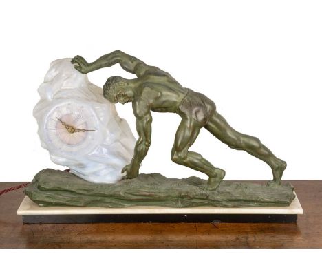 Art Deco style clock bronzed spelter and resin on a marble base, modelled as Sisyphus, 64cm wide x 38cm high x 14cm deep   At
