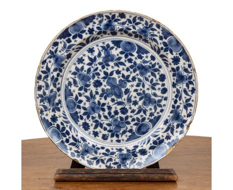 Delft Chinese style charger18th Centurypainted with typical Kangxi style flower sprays, 35cm diameterProvenance:- an Oxfordsh