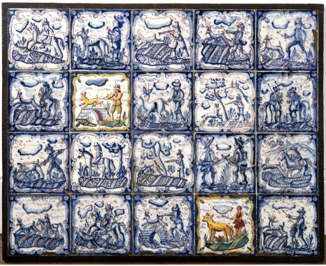Panel of twenty blue and white and manganese tiles18th Century, probably Spanish, each painted with various hunting scenes, i