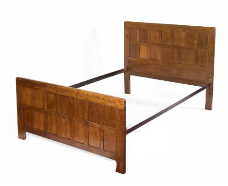 Robert Thompson of Kilburn (1876-1955)Mouseman double bed frame oak, with panelled head and footboard, metal rails carved mou