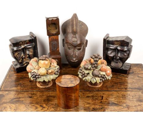 Group of wood piecesto include an African mask, with line-carved hair, and further carved details, 30.5cm long, a pair of boo