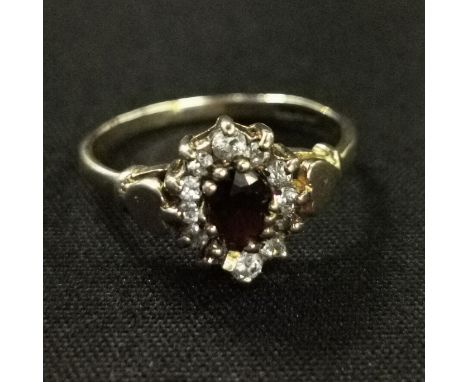 9CT GOLD AND DIAMOND GARNET RING