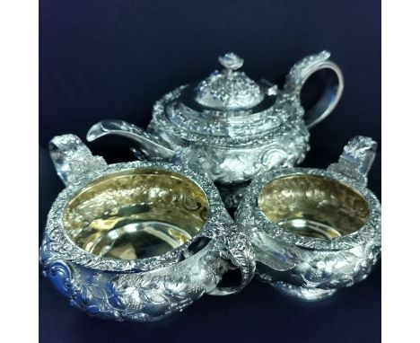 HEAVILY DECORATED 3 PIECE SILVER TEA SERVICE - LONDON APPROX 1.490 KG