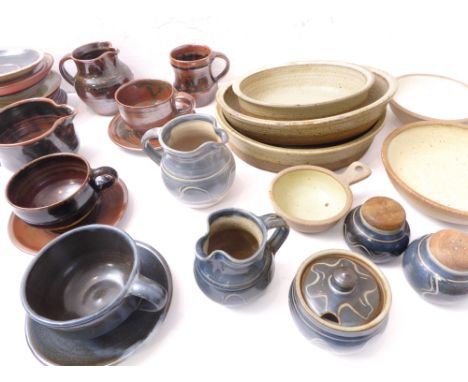 A good selection of studio pottery bowls including cups, saucers, jugs (tallest 11cm), a condiment set and 3 oval dishes (lar