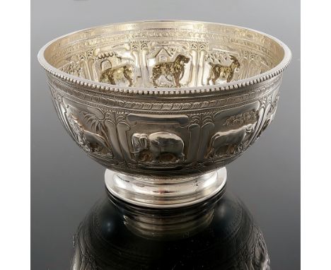 A Victorian silver bowl, Thomas Bradbury and Sons, London 1873, footed and rounded form with beaded rim, embossed with panels