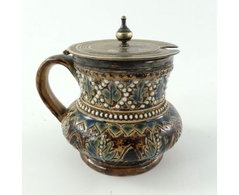 A Doulton Lambeth stoneware mustard pot, 1877, bulbous form with cylindrical neck, relief moulded and sgraffito decorated wit