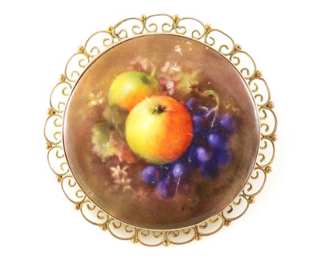 R Sebright for Royal Worcester, a fruit painted gold mounted brooch, 1916, circular, together with a bird painted oval brooch