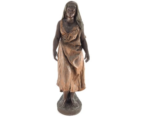 Goldscheider, an Orientalist terracotta figure of an African woman, circa 1900, polychrome decorated, incised indistinct numb