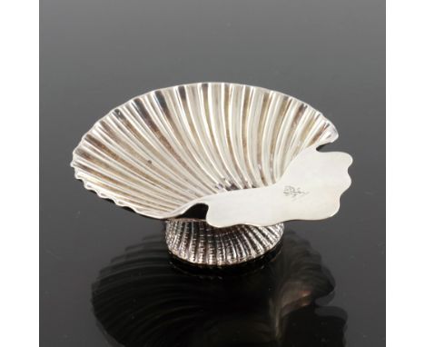 A Victorian silver scallop shell dish, Thomas Bradbury and Sons, London 1867, the bowl with shaped handle, on an inverted cas