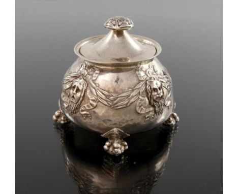 Omar Ramsden and Alwyn Carr, an Arts and Crafts silver tea caddy, London 1916, squat conical baluster form, planished and emb