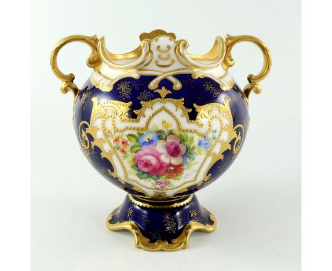 E Wood for Royal Doulton, a floral painted twin handled vase, footed ovoid form with denticulated rim, the central cartouche 