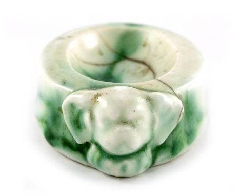 Charles Noke and Harry Nixon for Royal Doulton, a Chinese Jade figural soap dish, oval form, modelled with a dogs mask, 12cm 