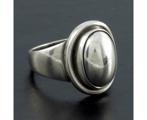 Harald Nielsen for Georg Jensen, a Danish silver ring, model 46 B, designed circa 1936, oval cabochon form on a stepped mount