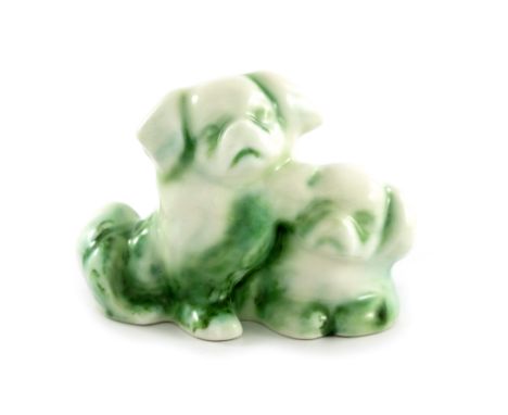 Charles Noke and Harry Nixon for Royal Doulton, a Chinese Jade figure group of two dogs, 9cm high