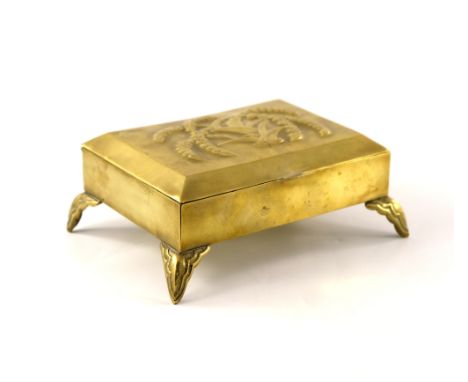 Karl Hagenauer, an Austrian brass casket, circa 1940s, the chamfered lid embossed with stylised palm, on four cast bracket fe