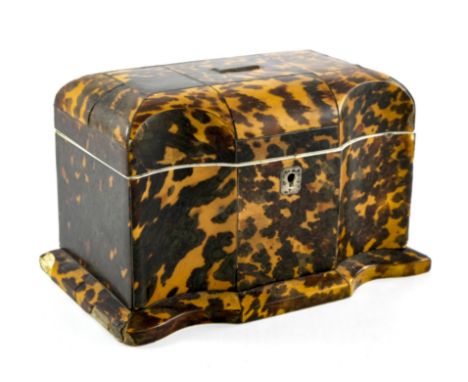 A Victorian tortoiseshell tea caddy, circa 1840, serpentine fronted cuboid form, hinged domed lid opening to reveal a double 
