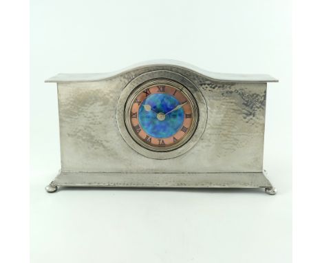 Liberty and Co., an Arts and Crafts Tudric pewter and enamelled mantle clock, model 01126, the 3.5 inch blue green enamel and