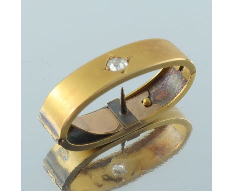 A late Victorian 15ct gold old-cut diamond scarf clip, oval ring form with pin, in fitted leather case, 3cm, 2.7g