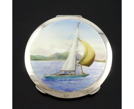 An Elizabeth II silver and enamelled compact, Henry Clifford Davis, Birmingham 1952, the lid painted with a yacht in full sai