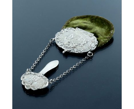 A Victorian silver and velvet purse, Henry Williamson, Birmingham 1900, embossed and chased in relief with pastoral scenes in
