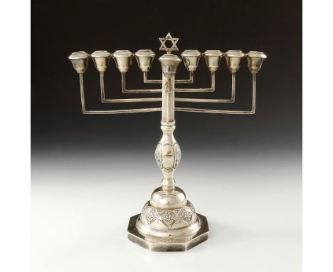 A George V silver Hanukkah Menorah, Rosenzweig, Taitelbaum and Co., London 1929, eight symmetrical branches and further 9th a