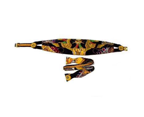 An Hermes Bowtie and Cumberbund Set. Condition: Good - Gently used with signs of wear. &nbsp; Shipping: Domestic: Flat-rate o