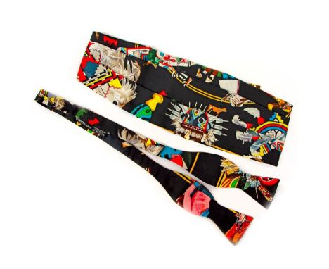 An Hermes Bowtie and Cumberbund Set. Condition: Good - Gently used with signs of wear. &nbsp; Shipping: Domestic: Flat-rate o