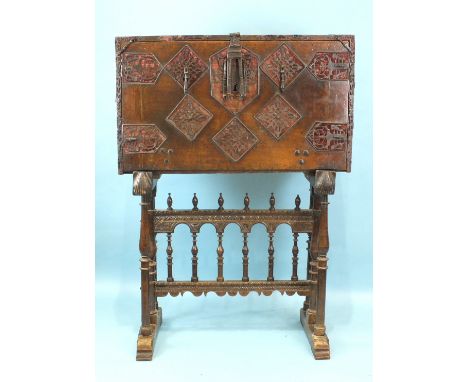 A 16th/17th century Spanish walnut, parcel gilt and bone-inlaid vargueno, the front panel extensively applied with cut iron m