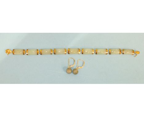A modern Chinese jade bracelet of nine curved plaques with 14ct yellow gold mounts, 19cm long, 11g and a pair of jade earring