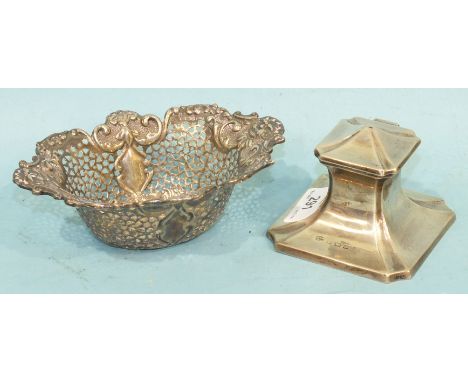 A silver oval bonbon dish with embossed and pierced decoration, Sheffield 1901,14cm long and a silver inkwell of square form 