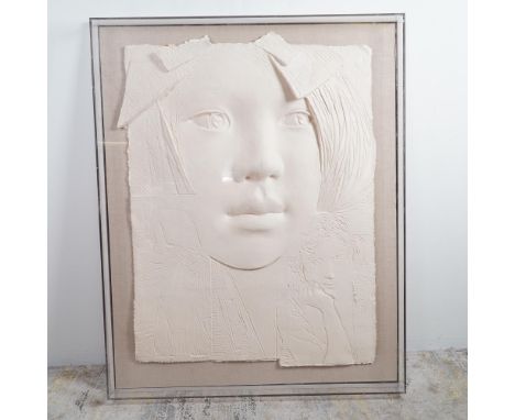 A striking embossed paper relief by Frank Gallo, depicting a young woman's face in a highly sculptural and tactile manner. Th