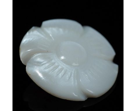 Delicately carved white jade flower pin featuring a five-petal design with fine incised details radiating from a central meda